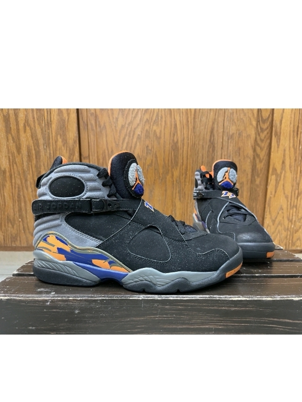 Jordan Black High-Top Sneakers with Orange and Blue Accents